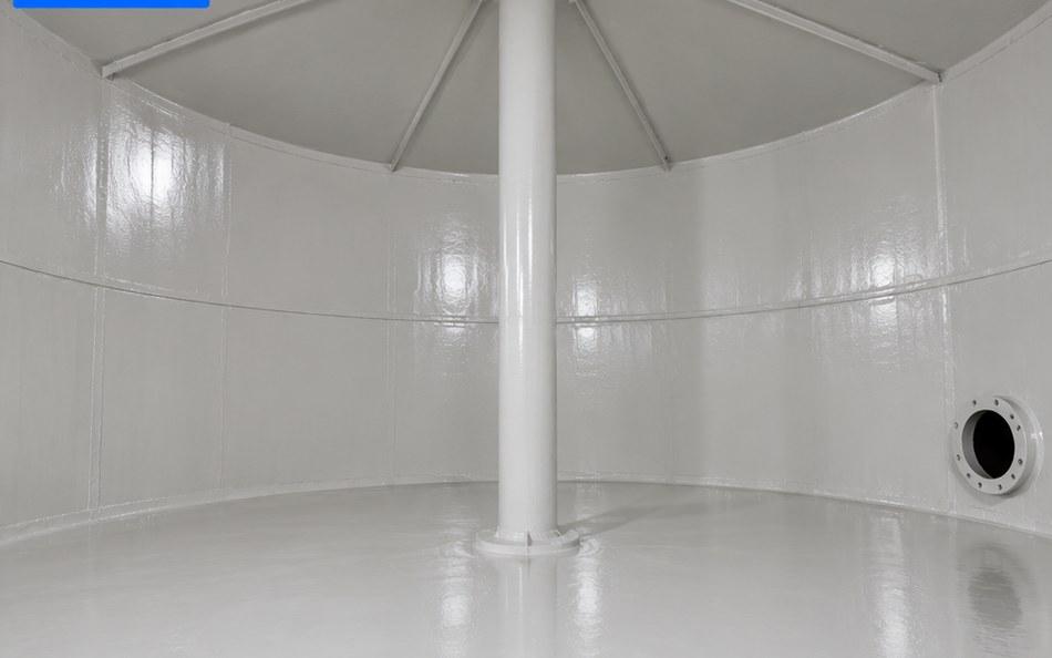 Representative image: the same tank interior after blasting and lining, clean grey walls and floor